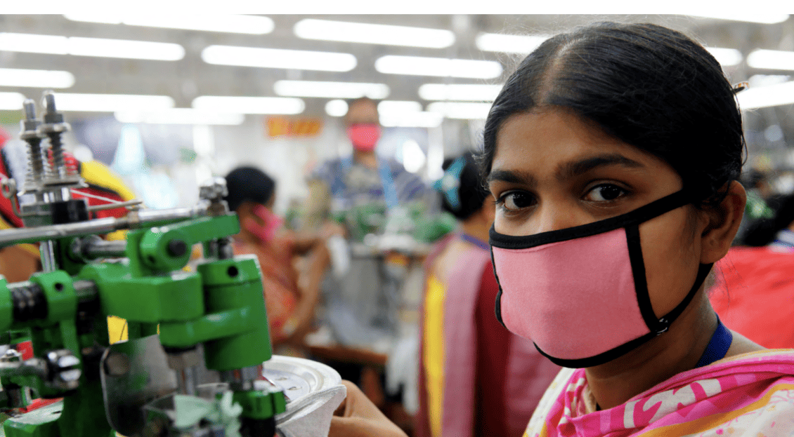 A Bangladeshi garment worker wearing a face mask. Credit Marcel Crozet ILO